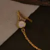 1 New French Retro-Style Gold Small Dial 3D Carved Flower-Shaped Bracelet Watch for Women, Fashionable, Simple, Luxurious, Elegant, with Small Rhinestones, Waterproof, Suitable for Daily Wear, Evening Events, and Other Occasions to Enhance Your Wrist Appearance