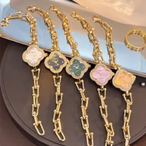 Lucky Four-Leaf Clover Design Watches for Women, Featuring Gold Chains and Gem - Studded Bezels